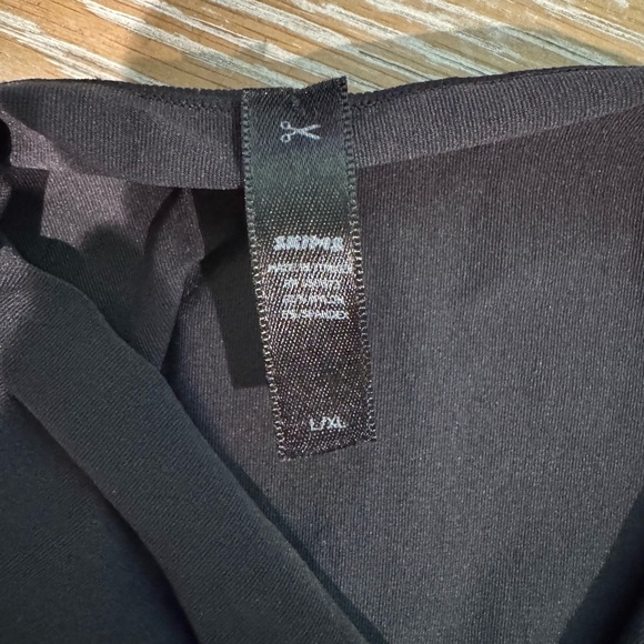 SKIMS size L/XL black body suit. - Picture 3 of 3